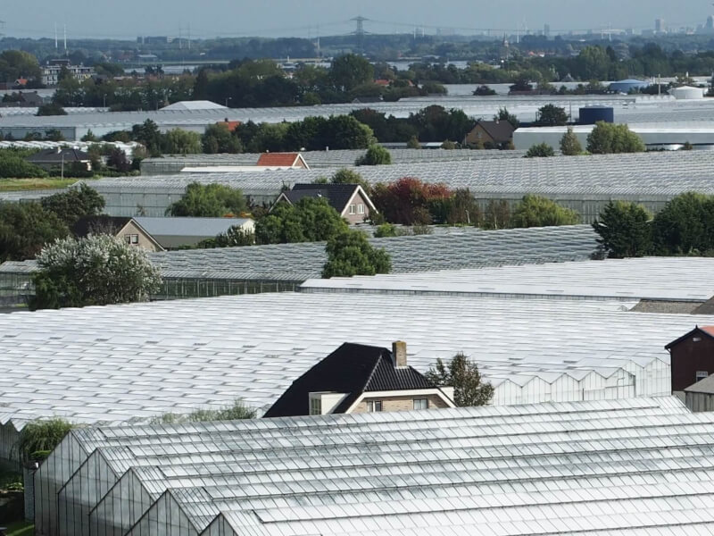 Wonen zicht van Poeldijkse kerktoren richting noordoost JE